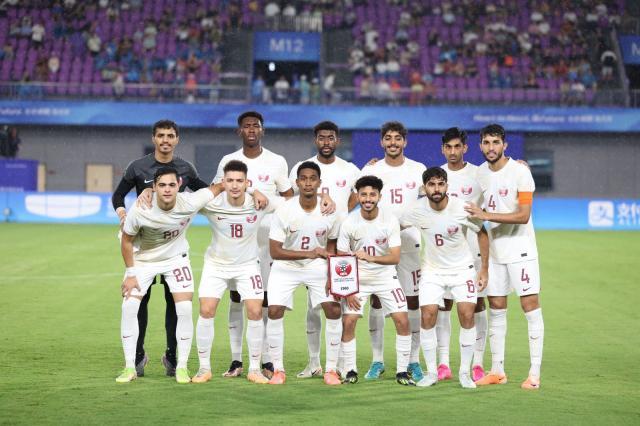 1695700727140036382.jpg 0-卡塔尔队对阵日本队的全家福.jpg